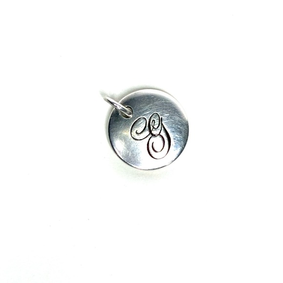 Tiffany Notes
Letter “G” Round Pendant in Sterling Silver - Picture 1 of 3